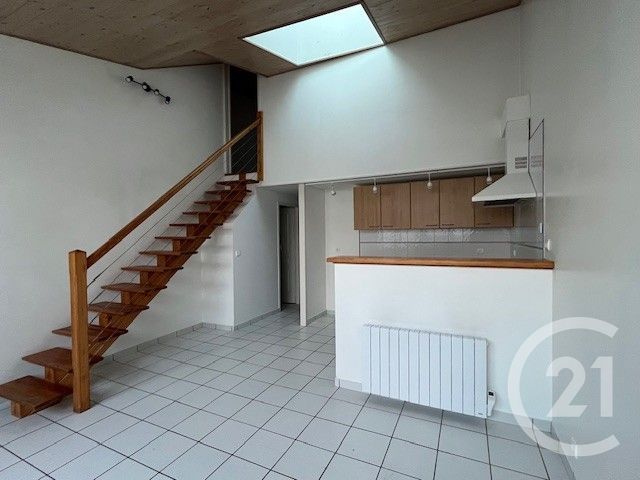 Appartement T4 à louer - 4 pièces - 72.56 m2 - LANGON - 33 - AQUITAINE - Century 21 Lgi Immo