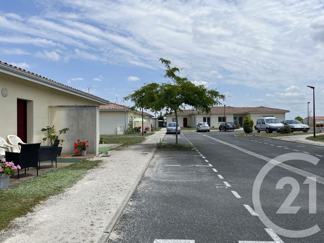 Appartement T2 à louer - 2 pièces - 41.89 m2 - GRIGNOLS - 33 - AQUITAINE - Century 21 Lgi Immo